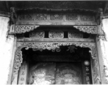 An ornate wooden surround for a doorway in China, for a building/courtyard taken over by Nationalist military or government. During WWII.  From the collection of Frank Bates.