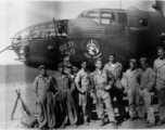 These 491st Bomb Squadron maintenance personnel pose for a photo after preparing "Old 59" for its triumphant return to the USA.  Wishing the plane a safe trip are Clayton E. "Fred" Nash, Wilbur Carter, Atkinson, Joseph A. Bicagalupo, Joseph F. Burns, Karl E. Hammett, center rear -- Frank Bates, William W. Byrant, Elmer M. Peterson, Arnold B. Christensen, Lloyd E. Kershaw . Yangkai, 1944.  (Info courtesy of Tony Strotman/Frank Willard Bates) 