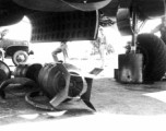 Large bombs being loaded onto a B-25 Mitchell bomber in China during WWII.  From the collection of Frank Bates.