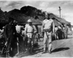 GI Joe and Chinese soldiers on a village street, probably outside of Yangkai base, Yunnan.