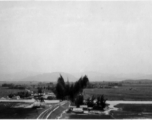 An aerial photograph of a bridge being bombed by the 491st Bomb Squadron in Yunnan or Indochina, during WWII.