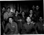 Both Chinese and American soldiers pose with KMT civilian official at rally. This should be An Zefa (安则法), a highly educated official who had a number of roles in Yunnan during WWII.