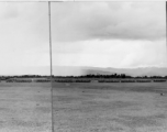 Panorama of Chinese soldiers in numerous ranks during exercises in southern China, probably Yunnan province, or possibly in Burma.