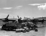 The B-24 "Maxwell House II" being refueled in a revetment in SW China, likely Sichuan, during WWII.