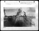 March 5, 1945 bombing by the 341st Bombardment Group, 22nd Bombardment Squadron, on Phu Lang Thuong railway bridge over the Thuong River at Bắc Giang City in French Indochina (Vietnam), during WWII. In northern Vietnam, and along a critical rail route used by the Japanese. In this image the bridge is finally broken, and the two water towers are completely gone.  Coordinates:  21°16'32.69"N 106°11'9.28"E