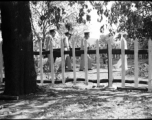 Solemn burial ceremony for American GIS who had died at a temporary war-time graveyard. In the CBI, during WWII.