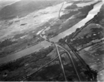 Bombing of Đò Lèn Bridge in Hà Trung Town in French Indochina (Vietnam), during WWII. In northern Vietnam, and along a critical rail route used by the Japanese.