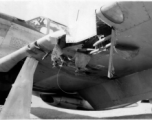 Damage to the forward edge of a wing of a P-51 fighter plane in the CBI during WWII.