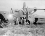 Johnson, Macaluso, Wild Bill Gornick, Lemmon pose with a crashed "Rum Runner" B-25 in Liuzhou June 1944.  William "Wild Bill" Gornick completed his required 200 combat flying hours on "Rum Runner" as it crash landed  following  a  mission against Tien Ho airbase.  Bill assisted the maintenance personnel with salvaging all the useable parts they could until he left for the USA a few days later.