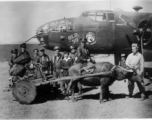 The crew of "Old 59", and well-wisher Barbara Vatter (American Red Cross Nurse at Yangkai) pose for a photo as the crew, after many, many combat missions, prepares to return to the USA. Once back in America they were scheduled to participate in a war bond tour.  Frank Bates had noted, "That's Bill Murphy holding the bull." The crew stands behind the cart, from the left, Capt. Robert Ebey (pilot), Lt Paul Sjoberg (cp), Sgt Francis Donnelly (rg), S/Sgt Lyle Wilson (eg), S/Sgt Rudolph Madsen (ag), Barbara Vatt