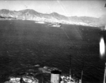 American planes bomb Japanese military shipping in occupied Hong Kong harbor, during WWII.