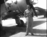 "Look at that Mustache."  Captain Wilson Porch aside plane (a C-64) marked with the Burmese mythical Chinthe.  Shamshernagar Air Base, India, June 1945.