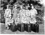 A group of trainees in photography during WWII, with boxes for "Type-C-I" ground cameras.  Edward H. Dixon is standing in back row, far left.