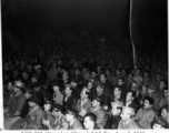 GIs applaud while watching performance, during AAF Day celebrations, August 1, 1945, at Yangkai, APO 212, during WWII.