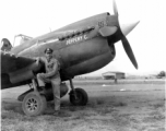 Glade C. Burton with his P-40 fighter "Jeffery C." in the CBI during WWII.