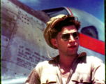 Stanley Mamlock posing before P-51 in the CBI.  During WWII.