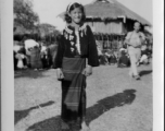 Local people in Burma near the 797th Engineer Forestry Company--A Kachin girl dress for Christmas on December 25, 1944, in Burma.  During WWII.