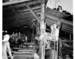 Operations of a mill of the 797th Engineer Forestry Company in Burma.  During WWII.