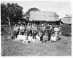 Local people in Burma near the 797th Engineer Forestry Company--women and children pose.  During WWII.