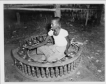 Local people in Burma near the 797th Engineer Forestry Company--Man plays linkwin (cymbals) in Burma.  During WWII.