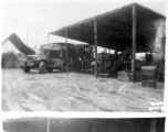 Men of the 2005th Ordnance Maintenance Company, 28th Air Depot Group, working on ordnance in a shed in Burma. During WWII.