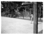 GIs play tennis at the American military Darjeeling Rest Camp, Darjeeling, India, during WWII.