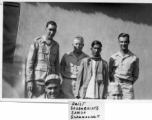 Men of the 2005th Ordnance Maintenance Company,  28th Air Depot Group, possibly in Barrackpore, India posing with Indian staff (left to right):  Henry M. Geist  Edmond R. Schumacher (kneeling)  John F. Schuhart  Samso  Irwin Schneckloth