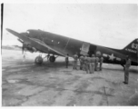 A C-47 transport of the ATC, tail #476342, on pavement at an airbase in in Burma during WWII.