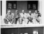 2005th Ordnance men drink beer and relax, likely in India, during WWII.