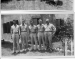 Boys of the 2005th Ordnance Maintenance Company,  28th Air Depot Group, in various poses--possibly showing of new sergeant stripes--in India or Burma. During WWII.