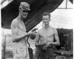 Men of 2005th Ordnance Maintenance Company, 28th Air Depot Group, prepare to spray paint anti-aircraft gun in Burma during WWII.