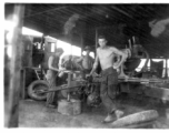 Men of the 2005th Ordnance Maintenance Company,  28th Air Depot Group, working on an anti-aircraft gun in Burma. During WWII.