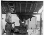 Men of the 2005th Ordnance Maintenance Company,  28th Air Depot Group, working on a gun in Burma. During WWII.