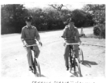 Hawkins and Bishop in a Tonga, at Agra.  Steedly "Sadie" Hawkins and Tom Dunham at Agra, India.  22nd Bombardment Squadron, in the CBI.