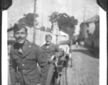 Radar mechanics Jack Leonard and Charles Klaes play with rickshaw in Kunming, Yunnan, China. During WWII.