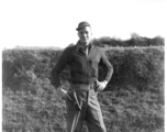 Carlisle Shepard posing with pistol at Zhanyi, Yunnan, China, during WWII, in February, 1945.