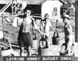 Latrine honey bucket crew at work at Chanyi (Zhanyi), during WWII.