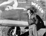 Flyer stands before F-7A/B-24 "My Assam Wagon."  24th Combat Mapping Squadron, 8th Photo Reconnaissance Group, 10th Air Force.
