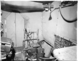 Aerial photographic compartment on F-7. 24th Combat Mapping Squadron, 8th Photo Reconnaissance Group, 10th Air Force. At Gushkara, India, 1945.  These F-7 were in equipped with extra gas tank in place of the forward bomb bay on a B-24, and a converted aerial photo compartment in the back bomb bay, to map areas at 20,000 feet above terrain.
