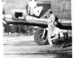 Nose art and camera port on F-7A/B-24 "Nasty Lil," serial #42-64055. 24th Combat Mapping Squadron, 8th Photo Reconnaissance Group, 10th Air Force.