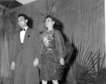 Dancing at a USO show in Gushkara, India, during WWII.  The boxes in front of the band players are labeled 748th ROB (748th Railway Operating Battalion).