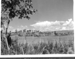 Rice paddies and walled town of Chanyi (Zhanyi), Yunnan, China, during WWII. 