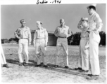 Newly-minted Medal of Valor recipients in India, 1945.  The officer in the picture on the left is First Lieutenant Donald J. Lochner, followed by Second Lieutenant Harold N. Olive, and finally Harry J. Hartz, all 24th Combat Mapping Squadron. The two men to the right are unknown.