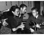 Alice Chong and Captain Addison Bailey dance while another GI plays guitar.  (Images and information primarily courtesy of Brian Dillon.)