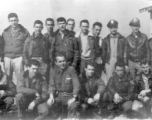 American flyers of the 528th Fighter Squadron pose in a group, probably in China. During WWII.