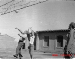 GIs of SACO play volleyball in northern China, during WWII.
