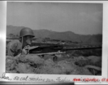 Ira Reiber mans a .50 cal. machine gun in Dushan, Guizhou province, China, during WWII.