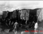 Allied gas train at the edge of the field, Liuzhou (Luichow), China Sept 1944, after a Japanese bombing raid, during WWII.
