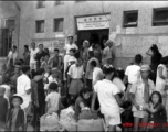 This is the Liuzhou city (Guangxi province) railway station during the evacuation as the Japanese advanced on the city in the fall of 1944. Notice that the picture quality is high enought to read the advertisements, slogans, and messages, left on the wall behind the crowd