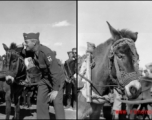 An American GI whispers encouragement to a donkey at a "race" arranged at Guilin during WWII.